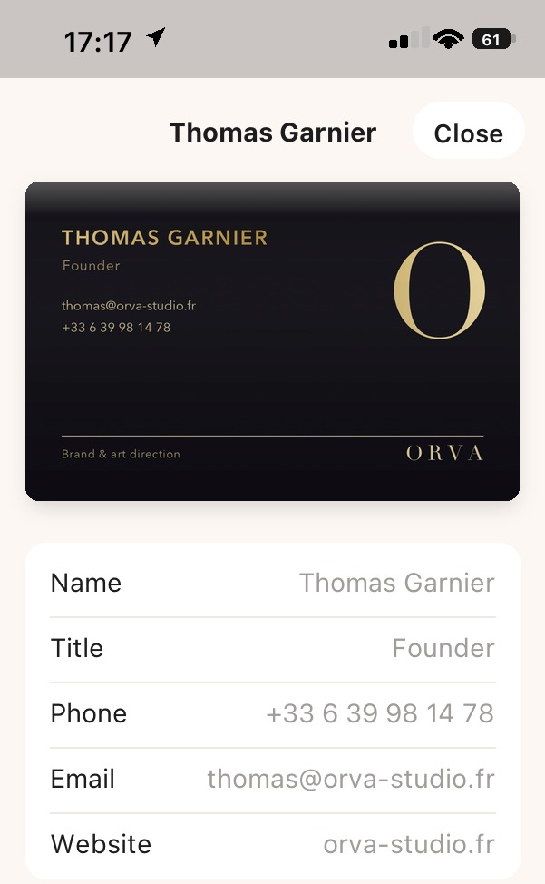 The resulting record: name, phone, email and website pulled out of the gold-foil card.