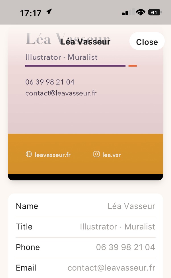 A contact record: the photo of the card at the top, then the name, job title, phone, email and website.